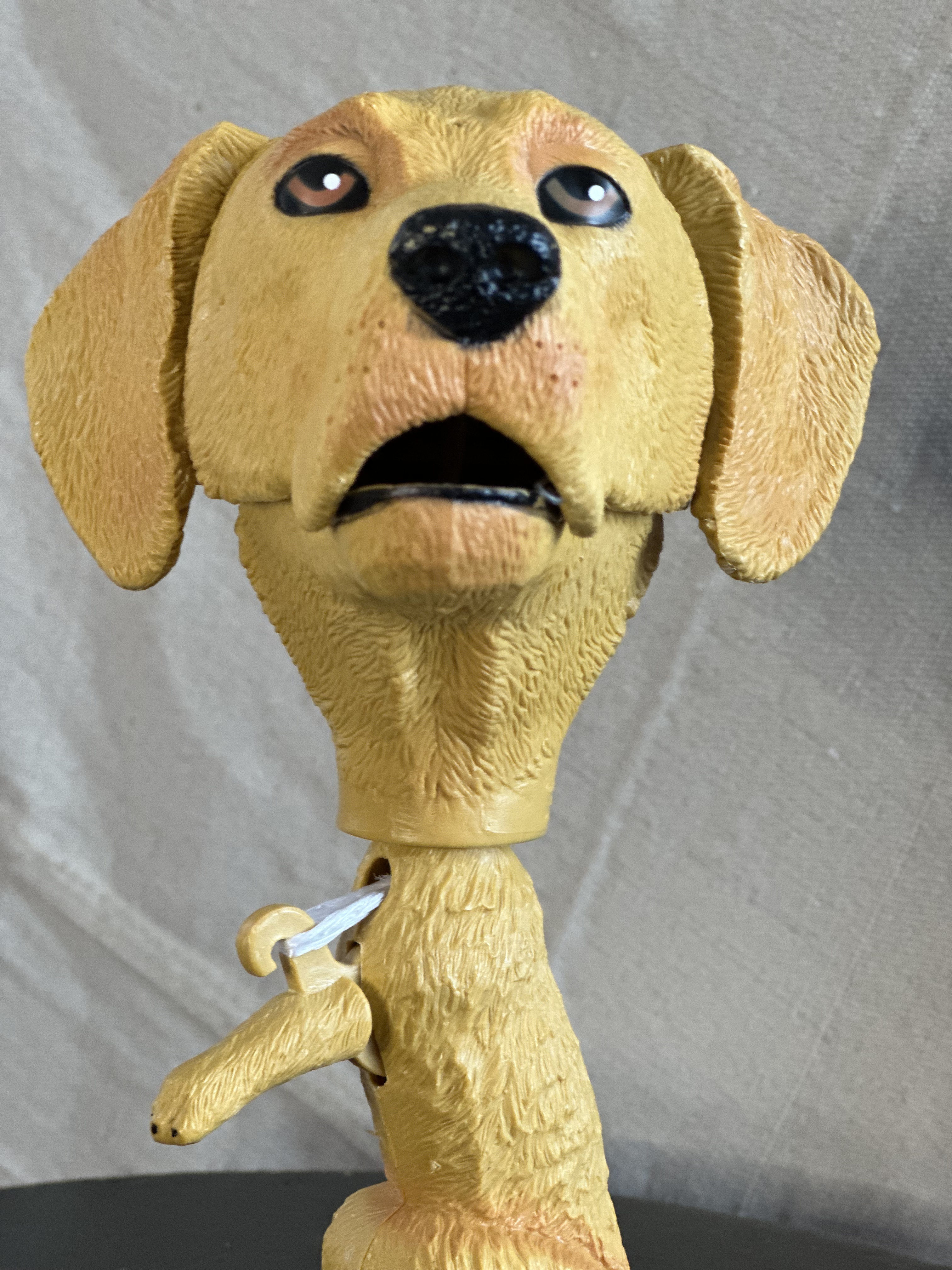 Season 5: Finn Hudson Memorial Dog Statue Toy.